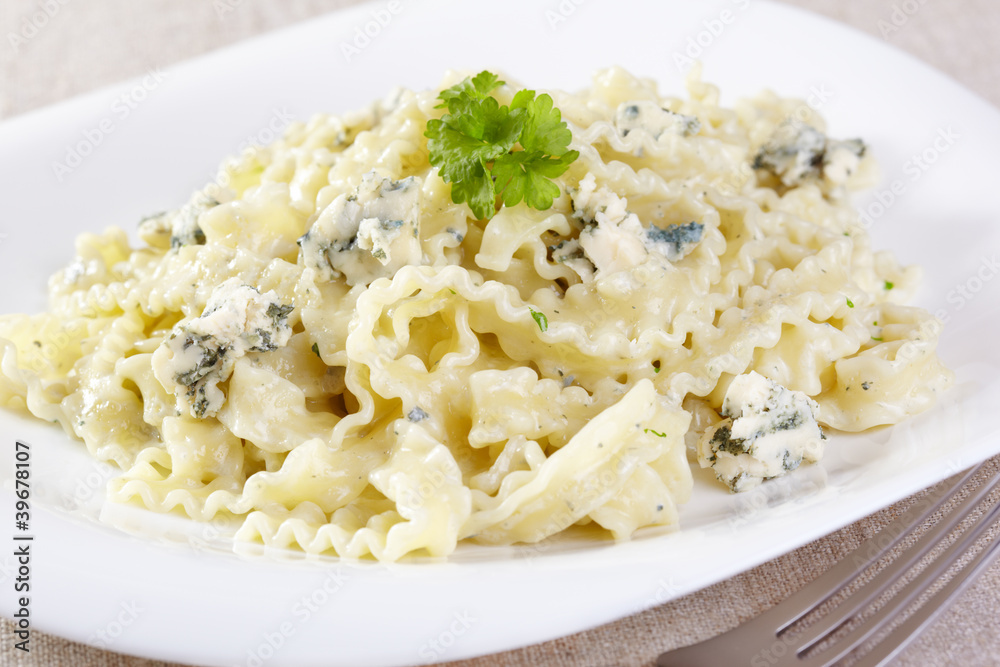 European cuisine. Pasta in cream sauce with blue cheese European cuisine. Pasta in cream sauce with blue cheese