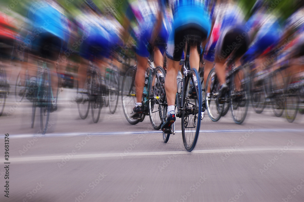 Fototapeta premium Blurred professional bike racers in a road race