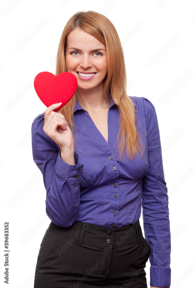 Young business woman holding red heart and smiling Young business woman holding red heart and smiling