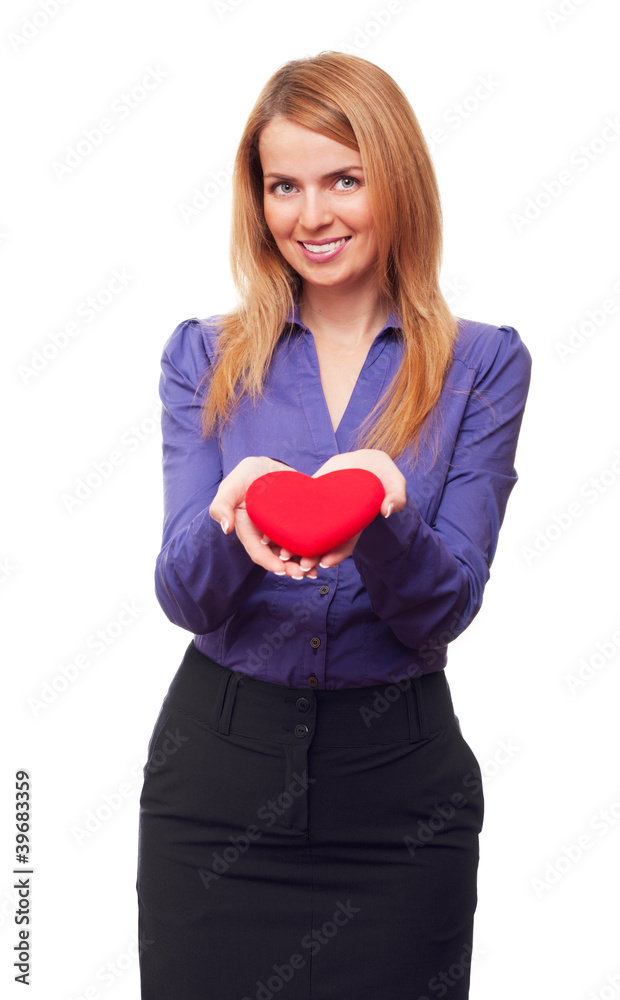 Young business woman holding red heart and smiling Young business woman holding red heart and smiling