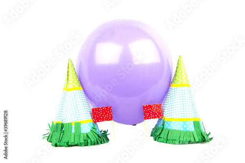 Party hats with balloon isolated in white
