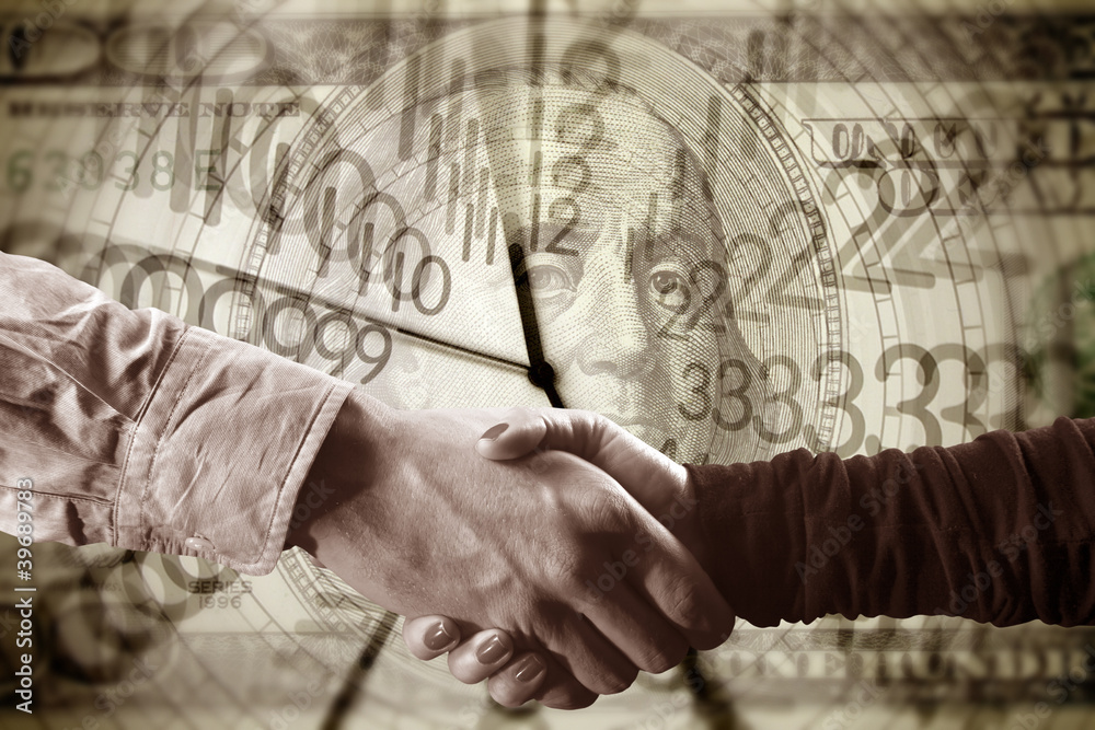 close up shot of handshake of a woman and a man close up shot of handshake of a woman and a man