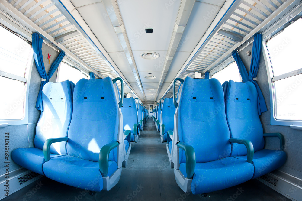 Fototapeta premium Empty seats inside a train. Fish eye view.