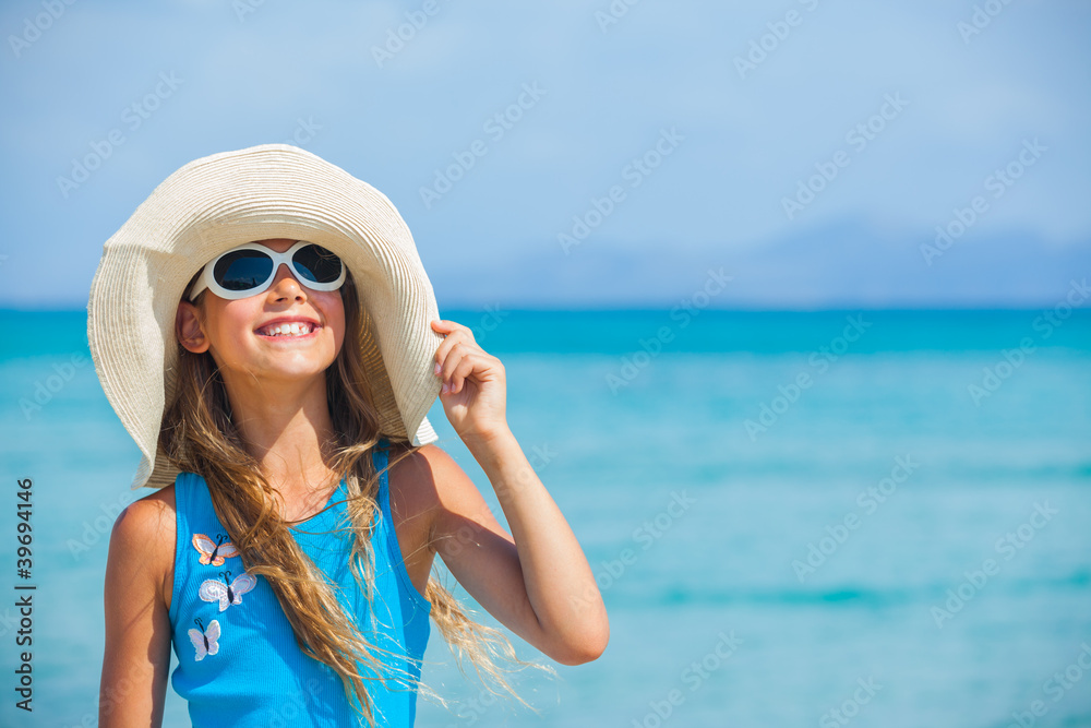 Girl in big hat relax ocean background