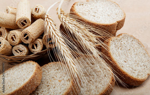 Fresh bread on a light brown background.