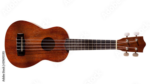 Hawaiian ukulele guitar with four strings isolated on white photo