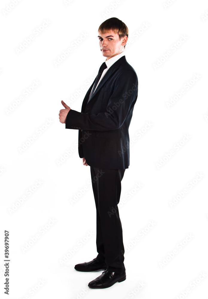 A young and successful business man in a dark business suit A young and successful business man in a dark business suit