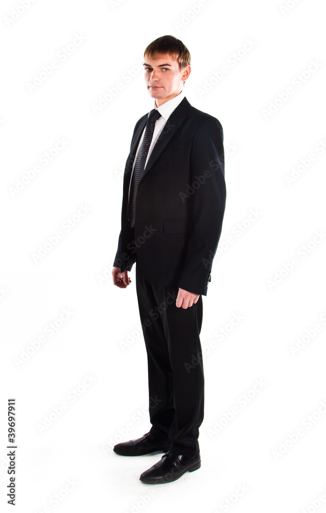 A young and successful business man in a dark business suit A young and successful business man in a dark business suit