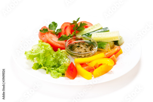 Fresh summer salad on white plate