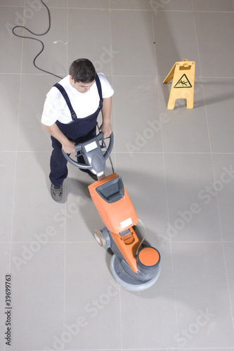 cleaning floor with machine