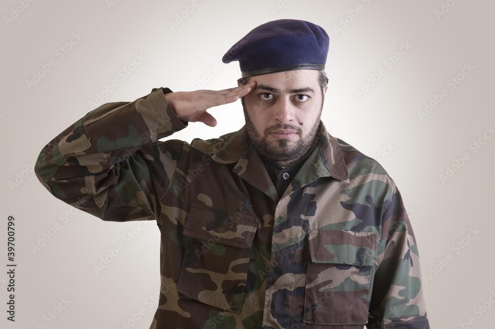 A soldier salutes - clipping path included