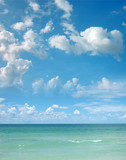 a background image of an open sea and blue sky