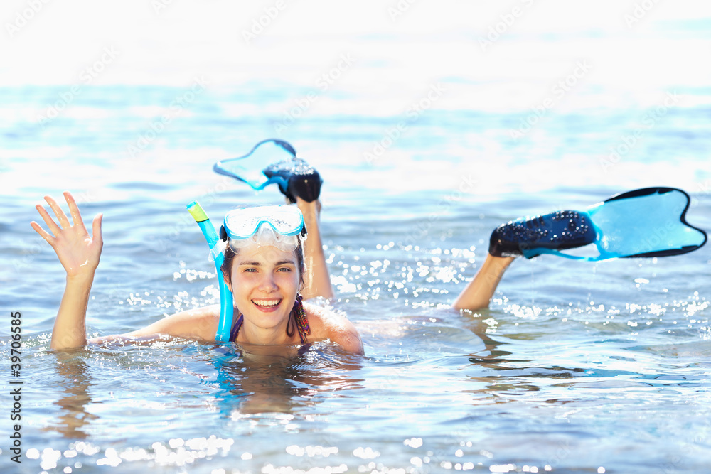 Girl with snorkel equipment