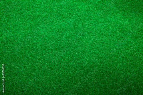 Background texture of green felt © Sandra van der Steen