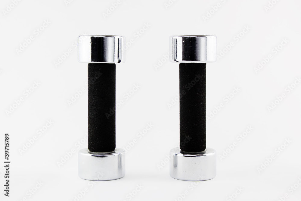 Two silver and black hand weight in vertical position