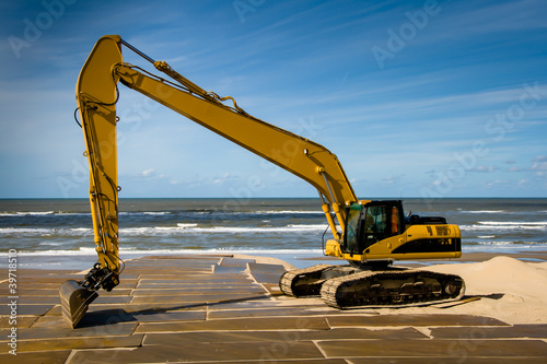 Excavator on the beach