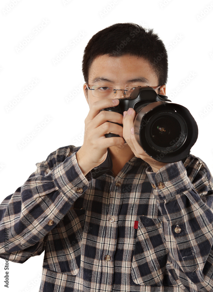 Male photographer holding camera Male photographer holding camera