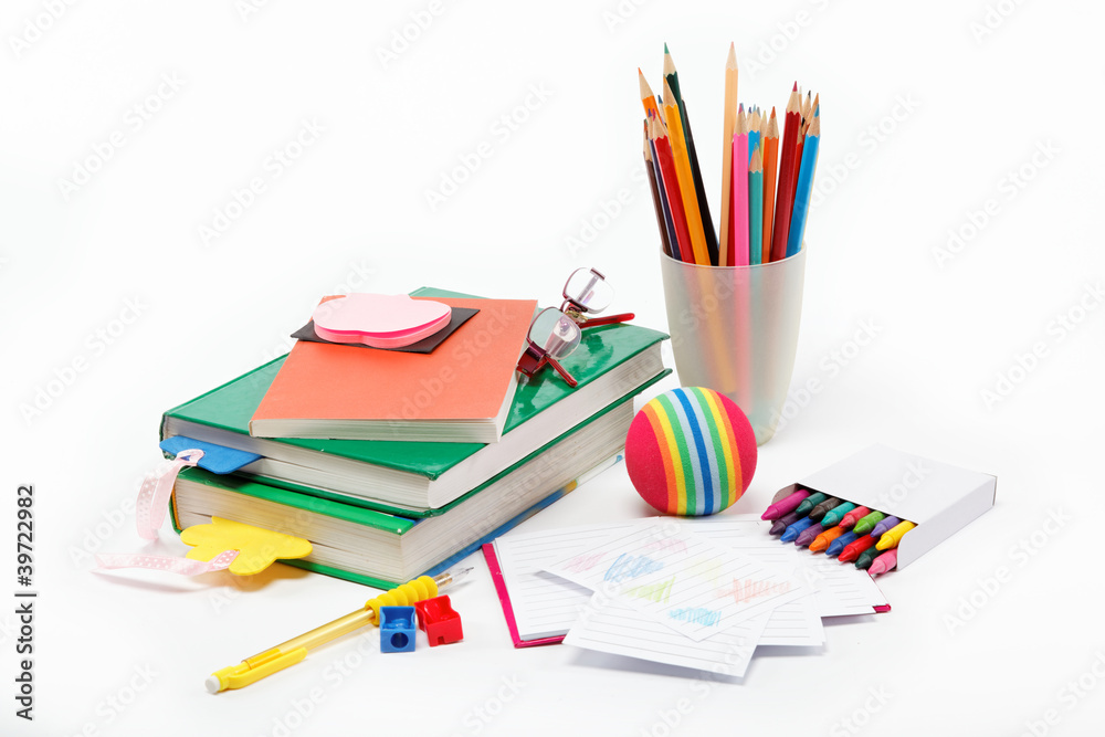Fototapeta premium School supplies: books, notebook, pens, pencils, glasses, an app