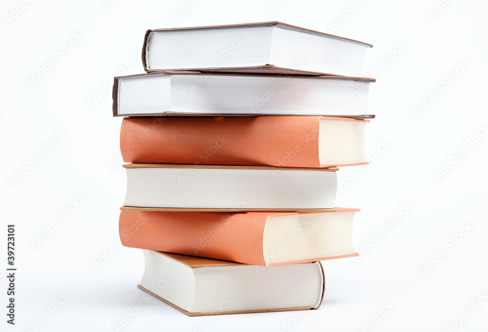 A stack of books on a white background. A stack of books on a white background.