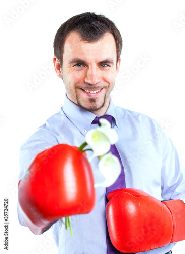 Portrait of a  business man in red boxing gloves © Max Topchii