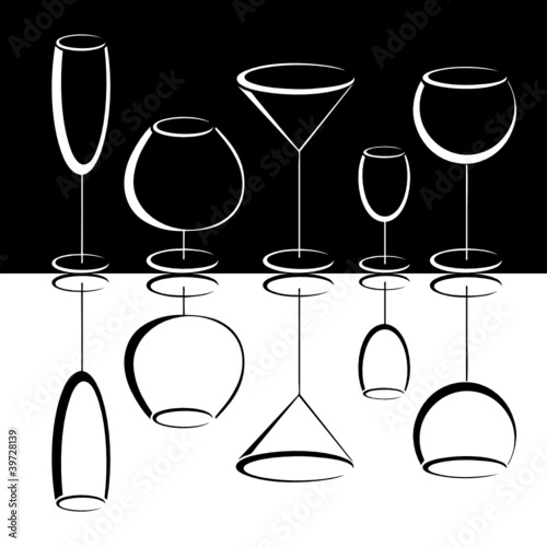 Black and white glasses of alcohol drinks