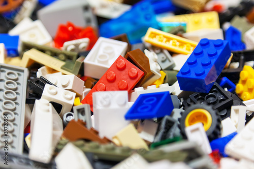 Heap of color plastic toy bricks