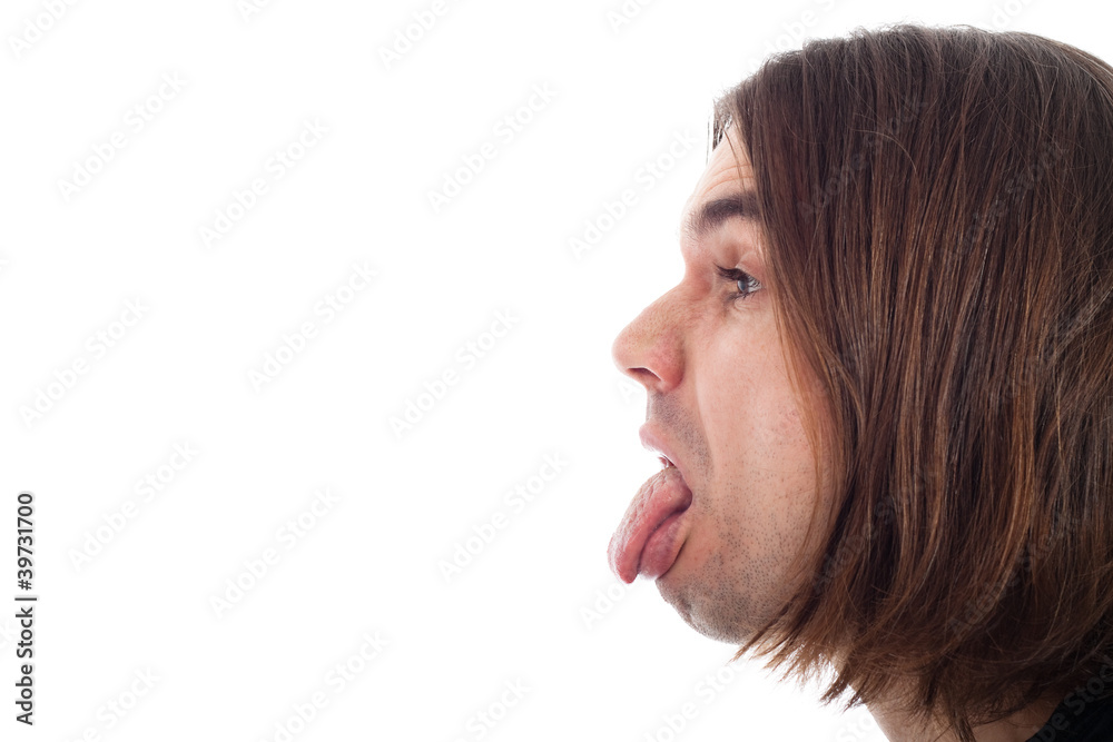 Obraz premium Profile of man face sticking out tongue