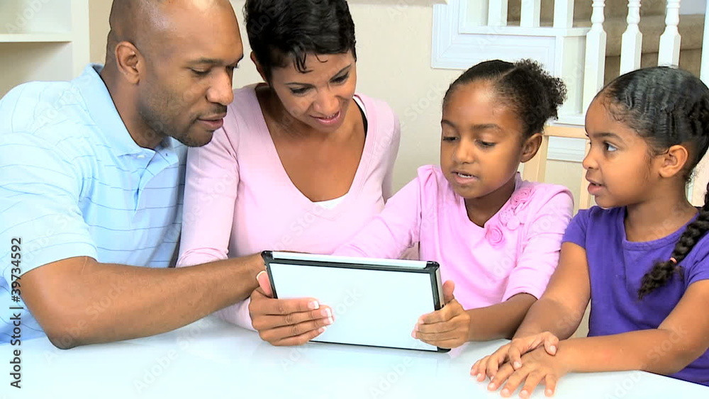Young African American Family with Wireless Tablet Young African American Family with Wireless Tablet