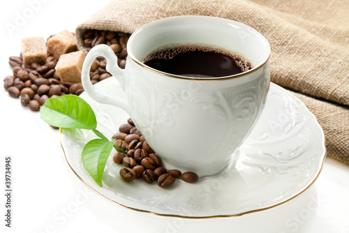 Hot coffee, coffee grains and brown sugar