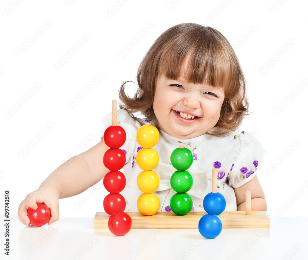 Obraz premium little girl playing with balls