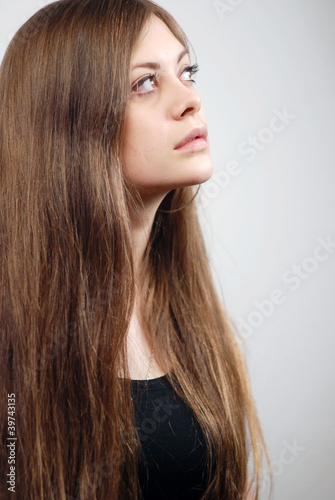 Beautiful Young Woman with long Hairs