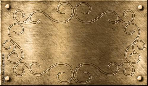 grunge brass plate with floral pattern photo