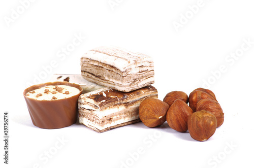 Chocolate and nuts over white