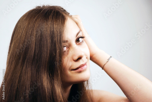 young brunette Woman looking at you