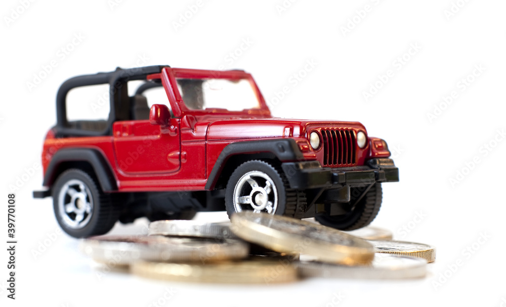 Obraz premium Samochód 4 x 4 jeżdżący na pieniądze
