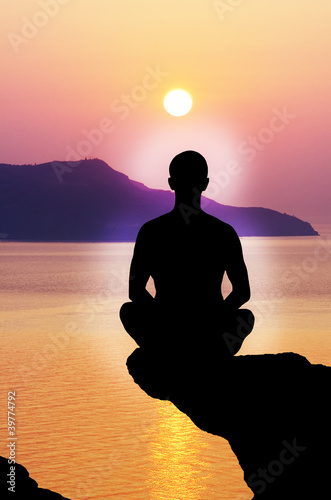 Silhouette of the meditating person