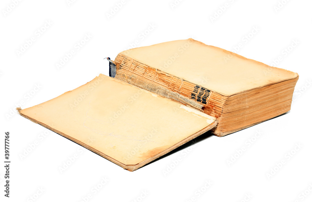 Fotografie openning aging book on white background