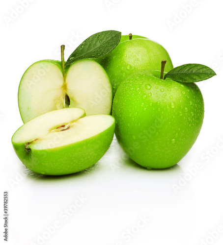 Green apple with water droplets on white background