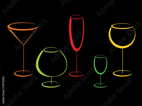 Color glasses of alcohol drinks on black
