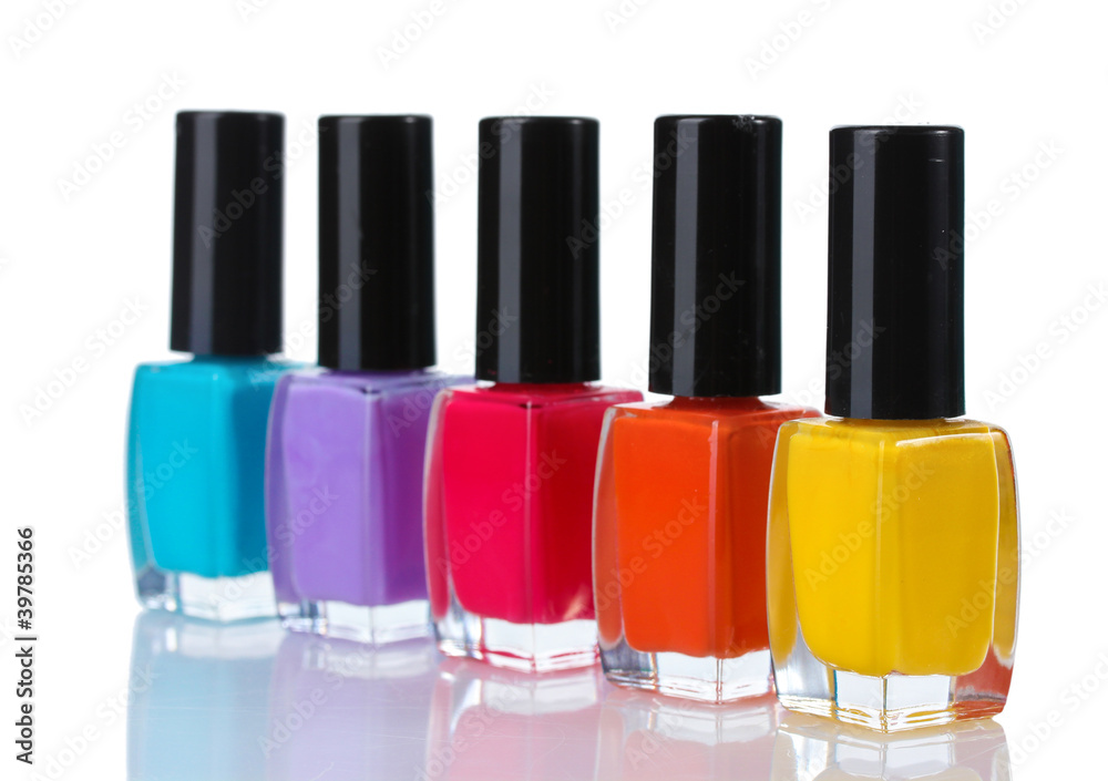 Group of bright nail polishes isolated on white Group of bright nail polishes isolated on white