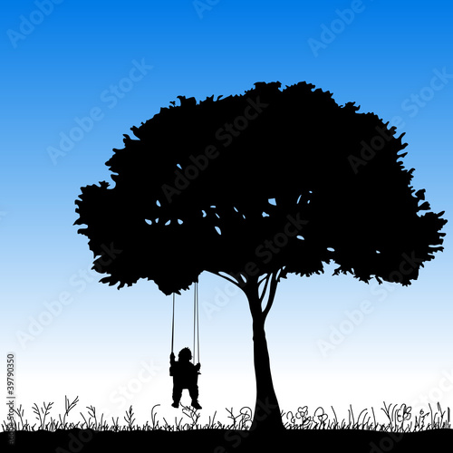 baby on a swing is swinging in a tree