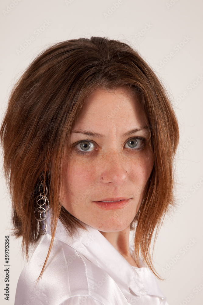 woman looking at the camera with serious expression woman looking at the camera with serious expression