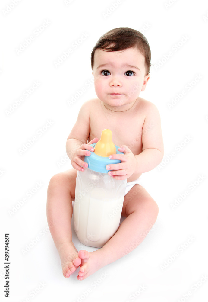 Adorable baby holding large bottle of milk Adorable baby holding large bottle of milk