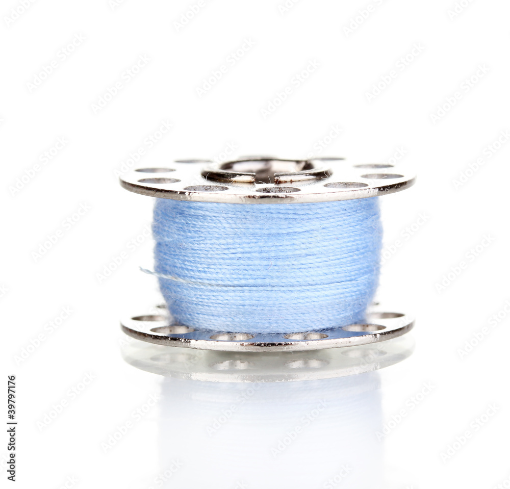 Metal spool of thread isolated on white Metal spool of thread isolated on white
