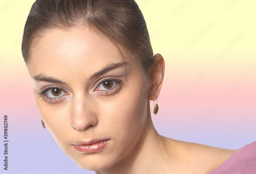 Beautiful girl stares into the camera Beautiful girl stares into the camera