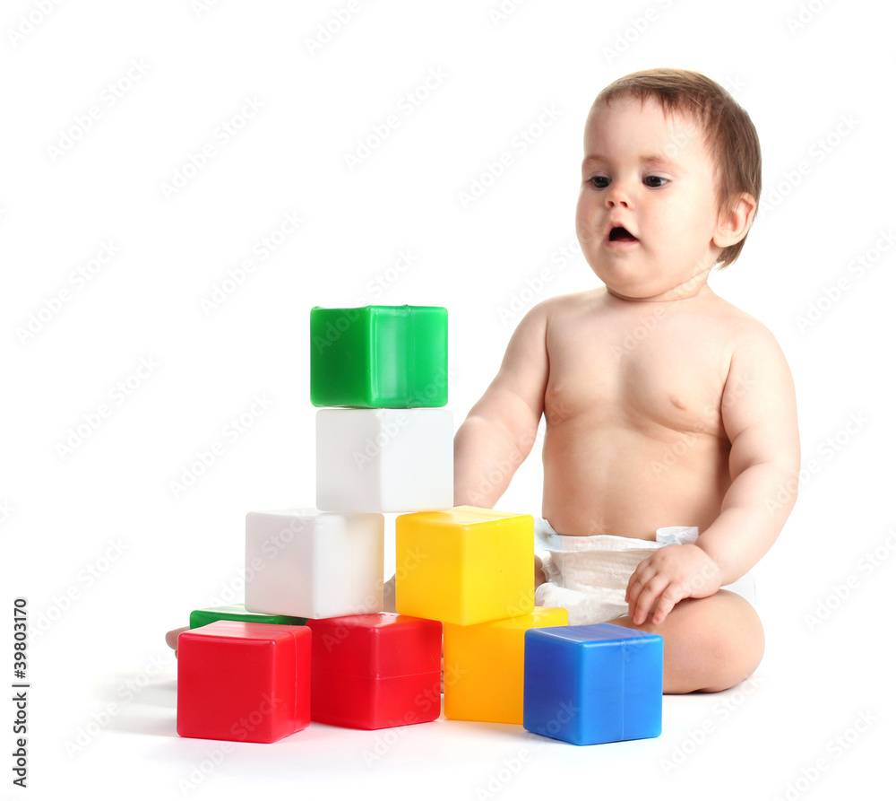 Cute baby girl playing with cubes isolated on white Cute baby girl playing with cubes isolated on white