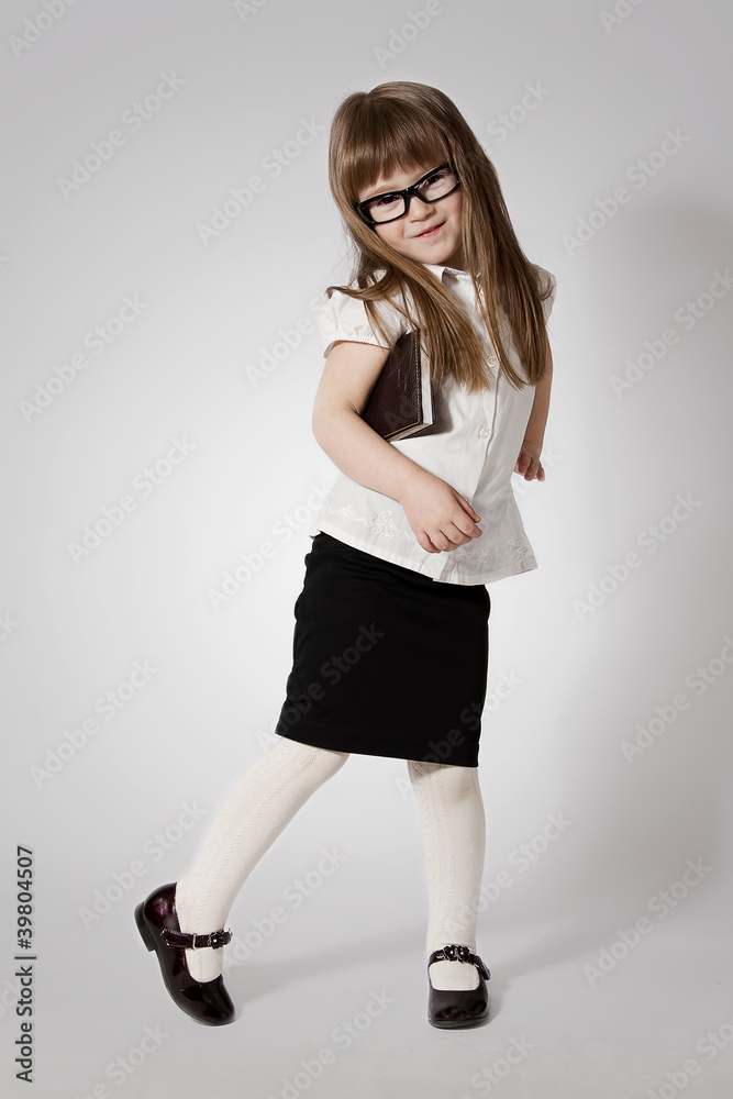 Smiling girl waering glasses with notebook Smiling girl waering glasses with notebook