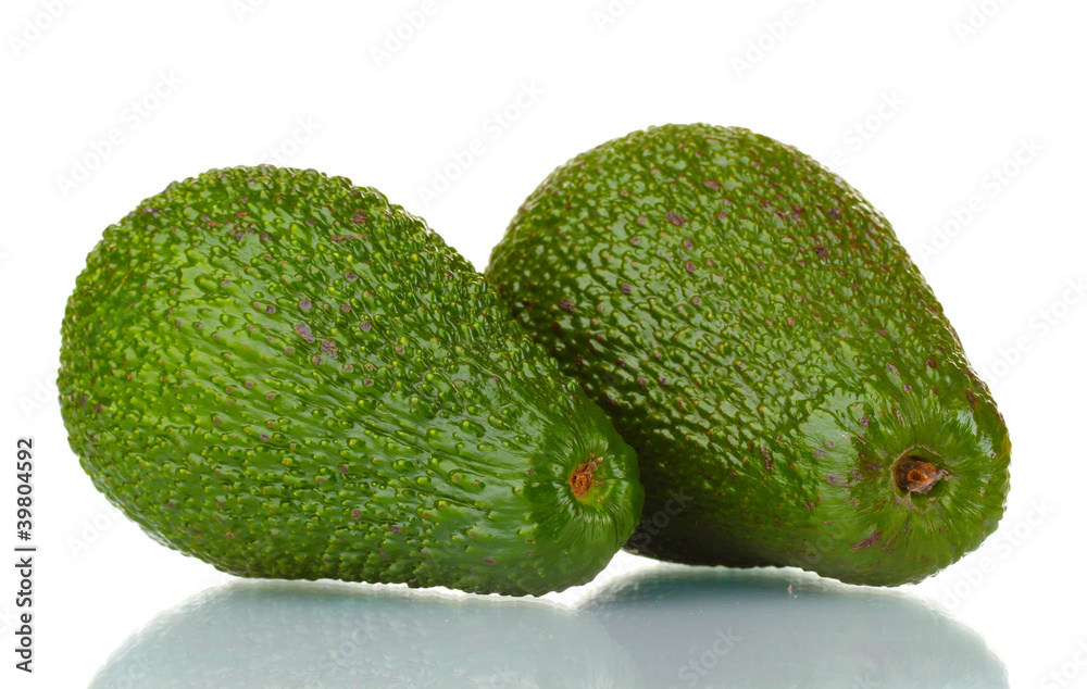 two ripe avocado fruits isolated on white two ripe avocado fruits isolated on white