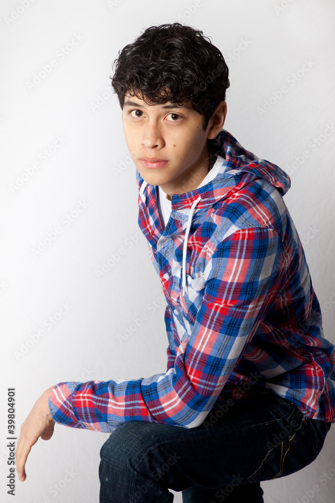 Hispanic man looking thoughtfully at the camera