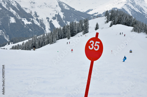 A red ski slope with number 35 photo